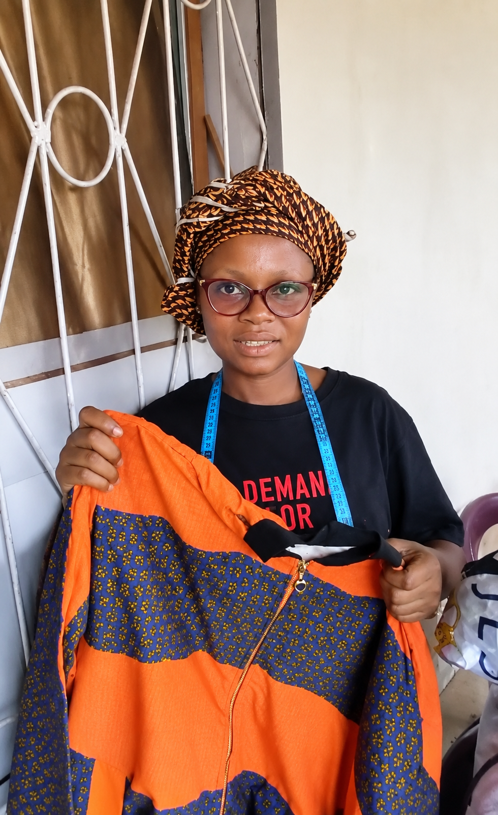 Young woman learning sewing